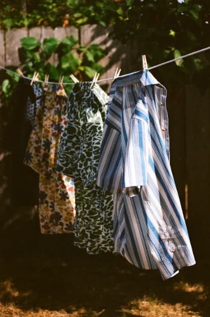 Breeze button-ups drying on a clothesline