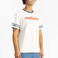 A man wearing Off White tee shirt having Manana branding with blue shorts