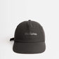 Black travel hat having Manana branding
