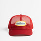 a picture of red mesh hat with Manana written on it