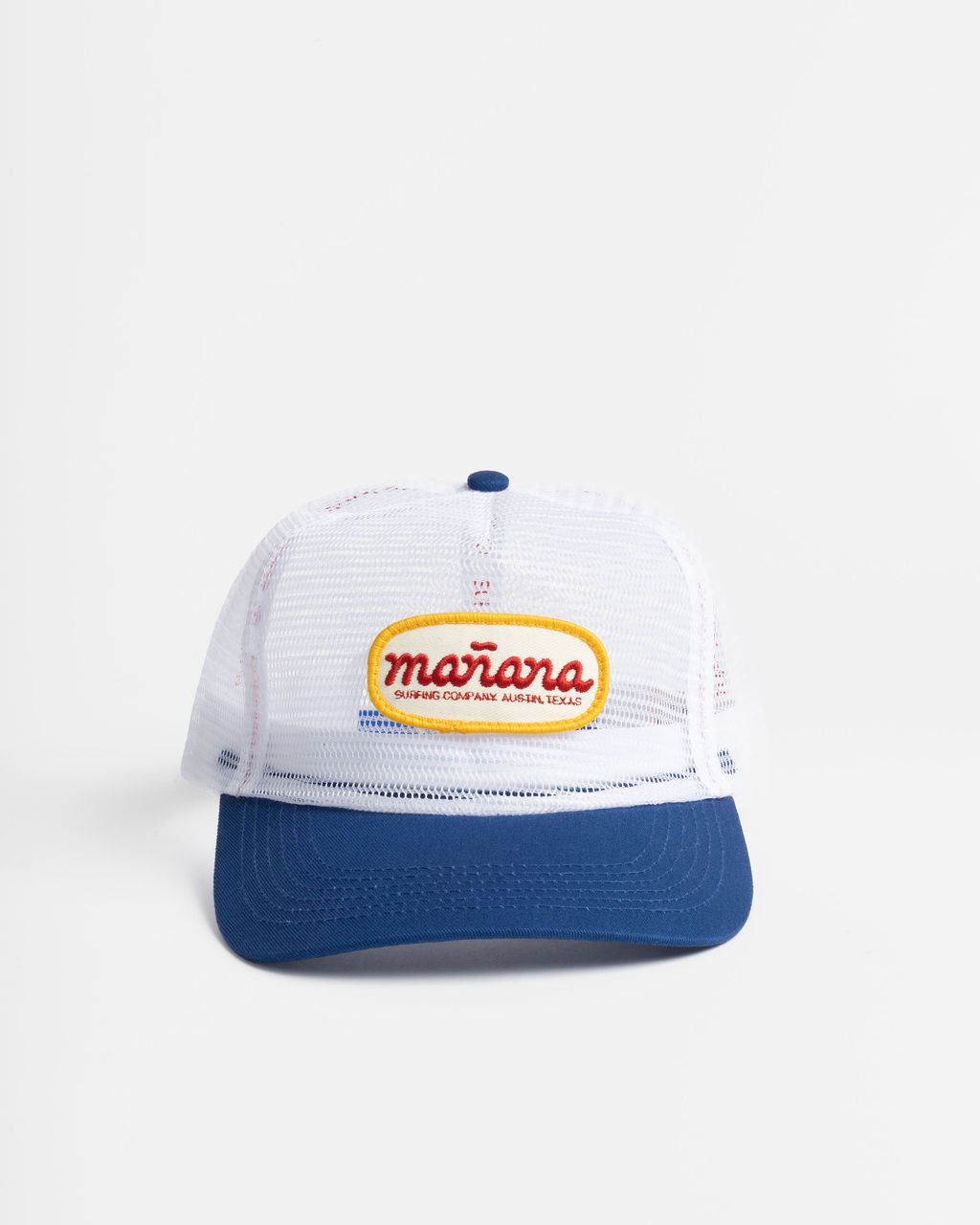 a picture of mesh hat with Manana written on it