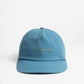 Lake Blue Travel Hat with Manana branding