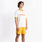 A man wearing an Off-White tee shirt having Manana branding with yellow shorts