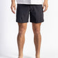 A man wearing a Black walk short underwear with white shirt